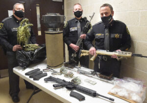 Marijuana grow, more than a pound of meth, multiple guns seized on Sunday